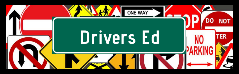 driver's ed street sign with traffic signs in the background